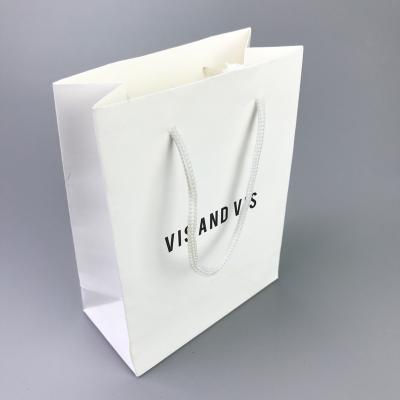 China Small Recyclable Custom Cheap Custom Paper White Black White Cardboard Paper Printing Packaging Carrier Gift Bag Drawstring Handles for sale