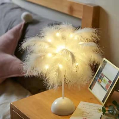 China Luxury ostrich modern cheap portable home decorative light table feather lamp for bedside living room decor for sale