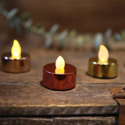 China Kanlong UV Electroplate Warm Light  Led Tealight Candle Christmas Party Mini Tea Light Flameless Candle for sale