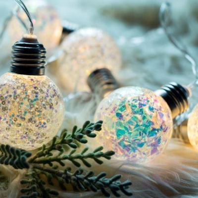 China Kanlong dia2.4inch  iridescent Christmas ball led bulb lights glitter inside 10L merry christmas lights for christmas decoration for sale