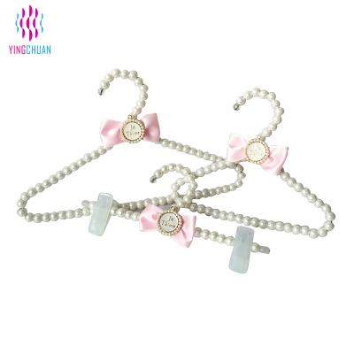 China Eco-friendly Hot Sale Pearl Hanger Hangers For Clothes White Pearl Hanger Wholesale for sale