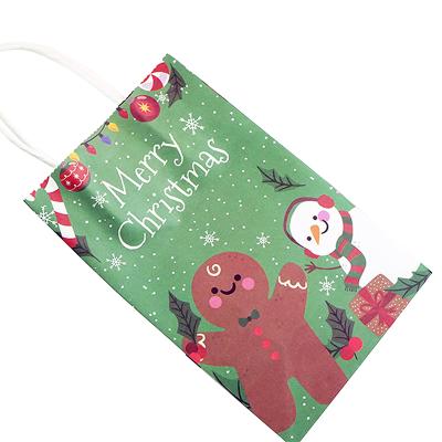 China Recyclable Cute Cookie Candy Chocolate Packaging Christmas Festival Wrapping Paper Gift Bags With Handle Bulk for sale