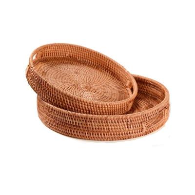 China Amazon Sustainable Hot Sale Woven Bread Rattan Baskets Vietnam Round Storage Serving Tray Set Tray With Handles for sale