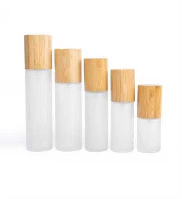 China 30ml 50ml 60ml Frosted Glass Mist Spray Bottle With Bamboo Cap 30ml-D37*H103 for sale