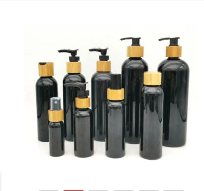 China 4 Oz Black Glass Spray Plastic Cosmetic Bottles for sale