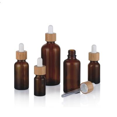 China Amber 18mm 18/415 1oz Essential Oil Bottles 30ml glass roller bottles for sale