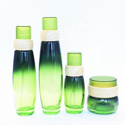 China 120ml 50g Green Essential Oil Bottles Lotion Glass Containers For Cosmetics 24/400 for sale