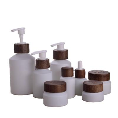 China 200ml Glass Cosmetic Bottles for sale