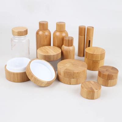 China 47mm 35ml Refillable Cosmetic Packaging  Jars With Bamboo Lids 28/400 for sale