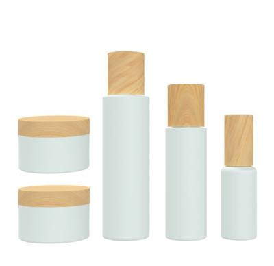 China 24/415 de cosmético plástico branco de 140ml 55g engarrafa o recipiente com tampas à venda