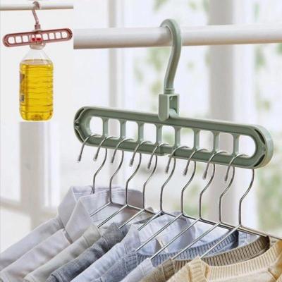 China 9 Holes 360 Eco-friendly Material Rotating Space Home Storage Saving Hanger Folding Plastic Laundry Clothes Rack for sale