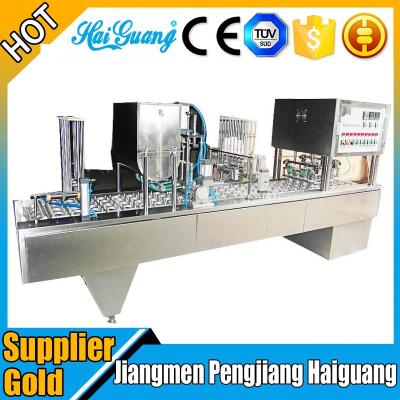 China CLOTHING Turkey Factory Sale Cup Sealer Machine / Double Juice Cup Filling Machine for sale