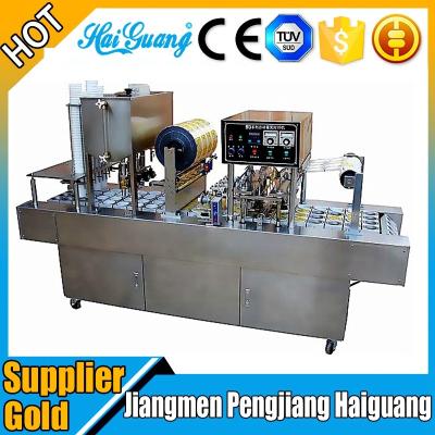 China Good Quality CLOTHING Cup Sealing Machine HS Code / Small Cup Filler Packaging Machine for sale