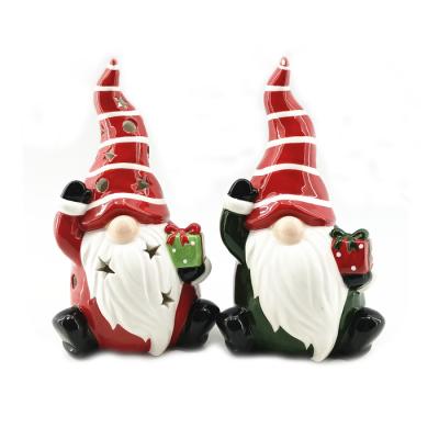 China European Design Hotsale Led Lighted Ceramic Santa Claus Holding Santa Christmas Indoor Decoration for sale