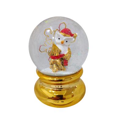 China Europe Resin Gold Based Empty Owl Snow Globe Custom Snow Globe for sale