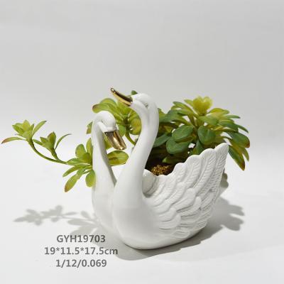 China Modern Cute Swan Design Small Shape Ceramic Animal Flower Planters For Office Decor for sale