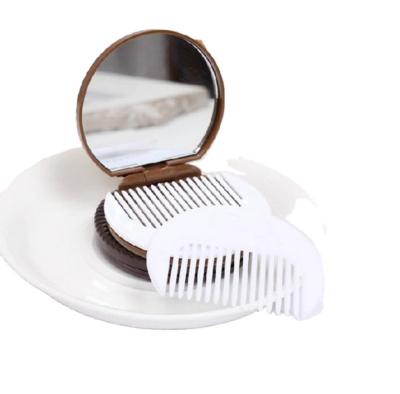 China Plastic Round Pocket Mirror Cocoa Cookies Mirror Shape Mirror With Comb Best Gift For Women's Day for sale