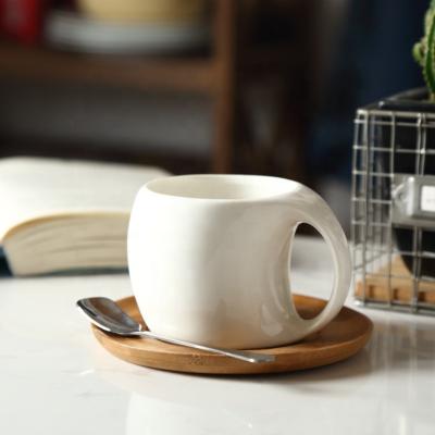 China Viable Wholesale Ceramic Coffee Mugs Set White Silver Spoon Color Coffee Mug For Home for sale