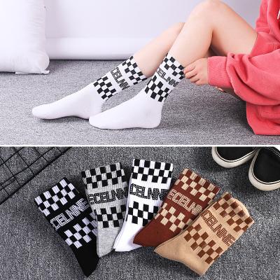 China Sportswear Chessboard Stockings Children's Tube Medium Men's Breathable Fashion Spring And New Autumn Black White CheckedSports Socks for sale