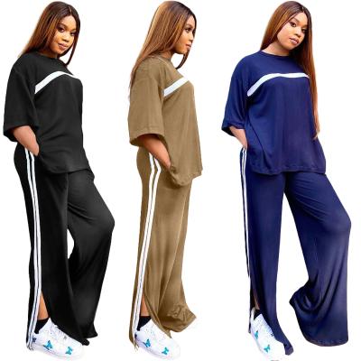 China QUICK DRY Winter 2021 Drop Women's Solid Color Ribbed Cut Out 2 Piece Jogging Suit for sale