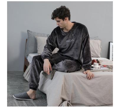 China New flannel fashion leisure version breathable loose couples of warm autumn and winter pajamas men and women can wear the suit at home for sale