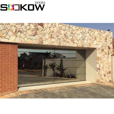 China Modern Transparent Vision Panel Garage Sectional Glass Door for sale