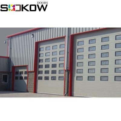 China Industrial Industry Warehouse Sectional Door With Strong Motor Industrial Door CE Approval for sale