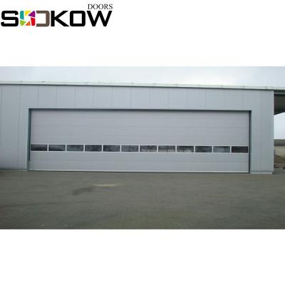 China Modern Easy To Assemble Industrial Insulated Sectional Industrial Doors for sale