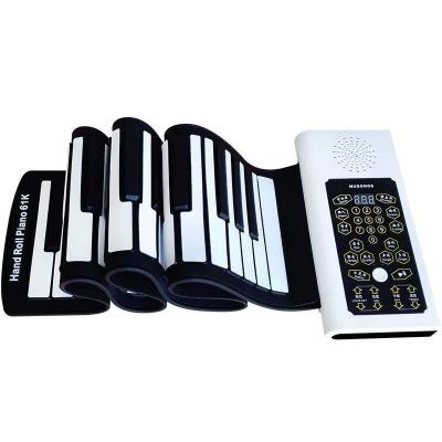 China Multifunctional hot sale foldable silicone portable soft keyboards 61 hand roll organ 61keys hand roll piano Christmas gifts for kids for sale