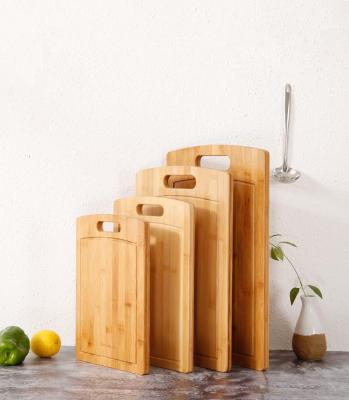 China Sustainable Wooden Cutting Board Extra Thick Bamboo Cutting Board With Handle Wood In Set Size for sale