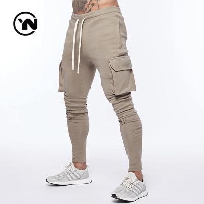 China Custom Anti-Wrinkle Mens Sports Sweatsuit Track Zipper Cargo Jogger Pants Streetwear Gym Fitness Stretch Tracksuit for sale