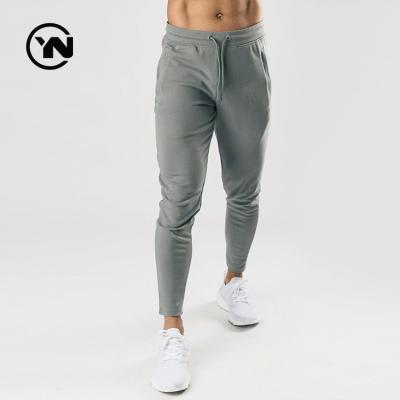 China Anti-pilling High Quality Sports Legging Sets Men's Fitness Sportswear Seamless Jogging Pants for sale