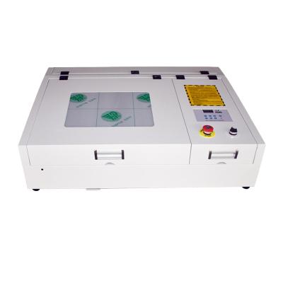 China Laser CUT 4040 CO2 40W Laser Engraving Machine With CE Wood Laser Cutting Machine Craft Laser Carver for sale