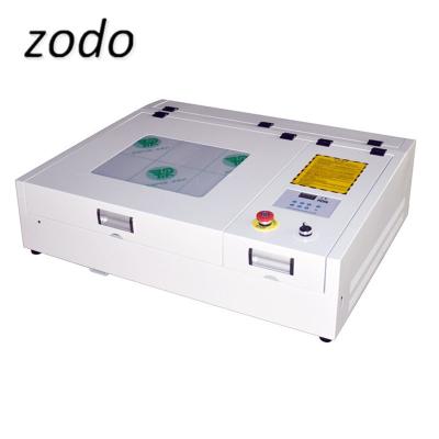 China Factory price 40W laser CUT 340 laser engraving machine home use 430 laser engraver 300*400MM CO2 laser cutter for small arts and crafts for sale