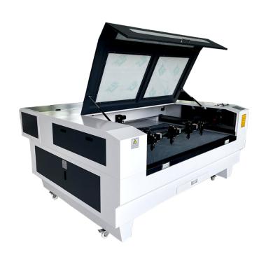 China LASER CUTTER 1600*1000mm 1610 130w 150w 180w Four Head Cloth Carpet Garment Textile Fabric CO2 Laser Cutting Machine for sale