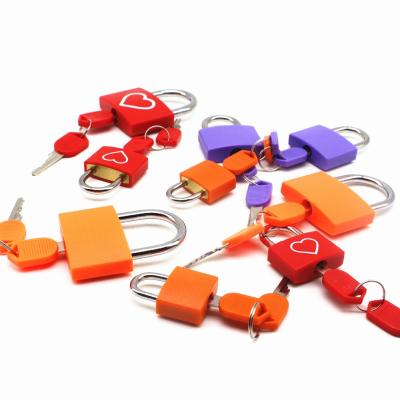 China OEM Small Travel Baggage Luggage Diary Bag Gift Lock Decorative Colorful Plastic Coated Rubber Jaket Cover Brass Padlock for sale