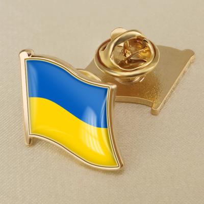 China 2022 Hot Selling Decoration Ukrainian Flag Crystal Drop Glue Pin All Over The World Flag Custom Badges for sale