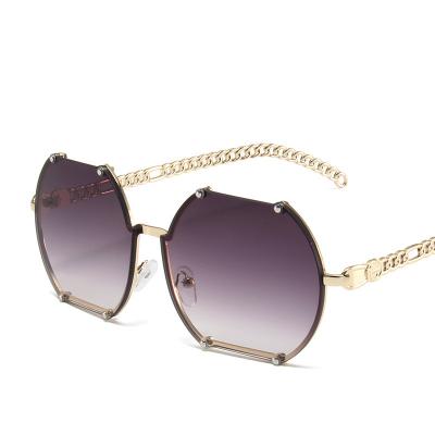 China Creative Personality Chained Irregular Metal Women's Sunglasses Retro Fashion Sunglasses Rimless Sunglasses for sale