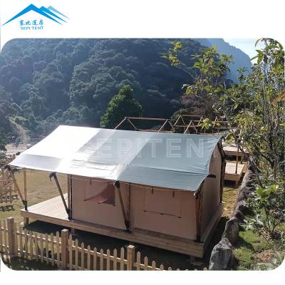 中国 Wooden safari tent luxury glamping tent waterproof canvas resort cottage 販売のため