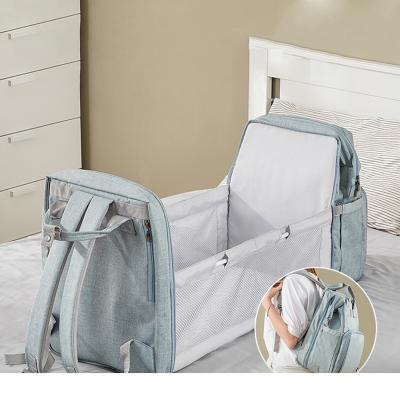 China Custom Logo Mummy Diaper Bag Waterproof Travel Backpack Water Resistant Diaper Bag With Changing Station Bed for sale