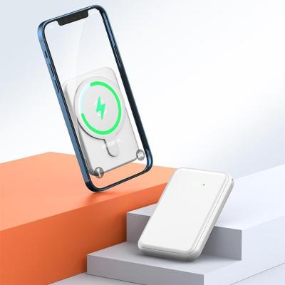 China 2022 Best Selling Amazon Power Wireless Charger Support Fast Charging Portable Magnetic Charger Bank 5000mah Mini Power Bank For iPhone for sale