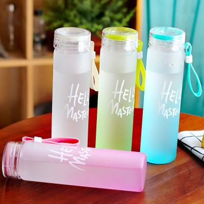 China Letter Glass Stocked Colorful Water Bottle With Cloth Bottle Cover Frosted Portable Drinkware Cup for sale