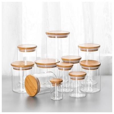 China 30ml 40ml 60ml 80ml 100ml 120ml Heatable Food Glass Jar Wooden Lid 200ml 300ml 500ml Airtigh Glass Jar Container With Bamboo Lid For Food for sale