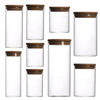 China Heatable Airtight No Smell High Borosilicate Glass Jar With Lid Storage Bamboo Wooden Bottles And Jars for sale