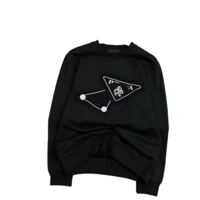 China New 2022 spring triangle anti-wrinkle sticker embroidery label fashion trend thin round neck long sleeve soft sweater for sale