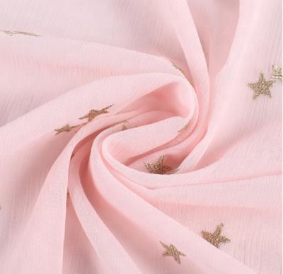 China Anti Pill Print 100% Polyester Chiffon Crepe Silk Fabric With Metallic Stars Print For Skirts for sale