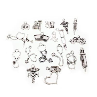 China Fashion $6.9 for 72 pcs/set Wholesale Antique Silver Medical Instrument Pendant Charms Alloy OEM/ODM Accepted for sale