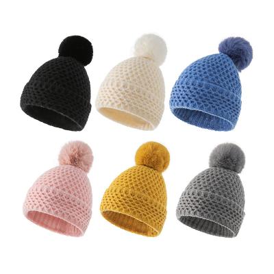 China OEM de acrílico unisex de Pom Pom Hat del punto del multicolor para el invierno en venta