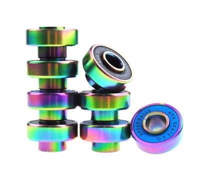 China Super Longboard SKATERGEAR Precision Biltin Style Longboard Bearings With Rainbow Colored Titanium for sale