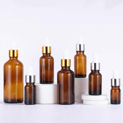 China Personal Care 5ml~100ml Amber Dropper Bottle With Aluminum Ring Empty Essential Oil Essence Hydrosol Glass Bottles Customzation Logo for sale